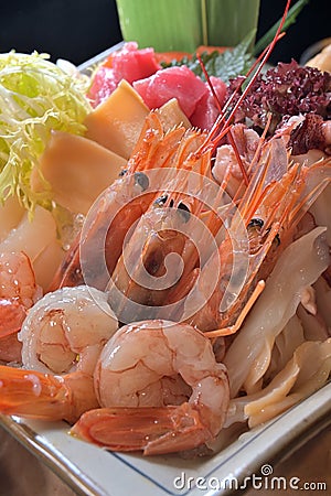 Sashimi raw shrimp platter platter feast Stock Photo