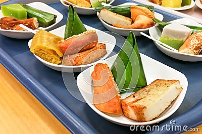 Assorted Malaysia Nyonya kuih kueh served on plate Stock Photo