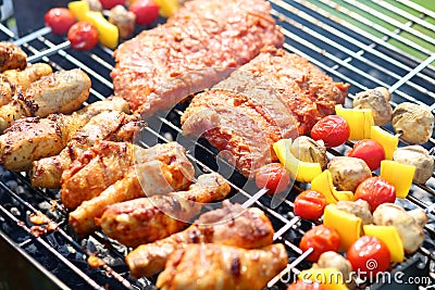 Assorted meat on bbq grill Stock Photo