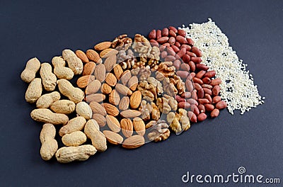 Assorted mixed nuts, peanuts, almonds, walnuts and sesame seeds. Stock Photo