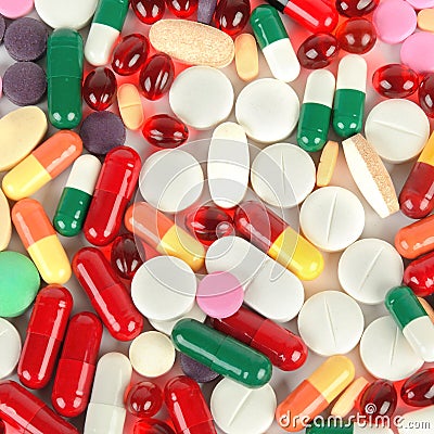 Assorted pharmaceutical medicine pills, tablets and capsules background. Stock Photo