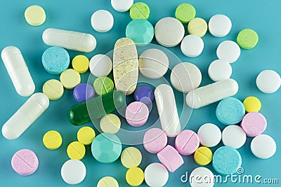 Assorted pharmaceutical medicine pills, tablets and capsules on Stock Photo