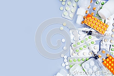 Assorted pharmaceutical medicine pills, tablets over grey background with copy space. Healthcare, medical and pharmaceutical conce Stock Photo