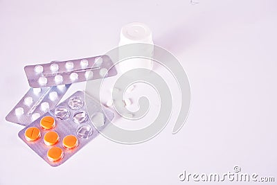 Assorted pharmaceutical medicine pills and tablets on the white background. Medical, pharmacy and healthcare concept. Copy space Stock Photo