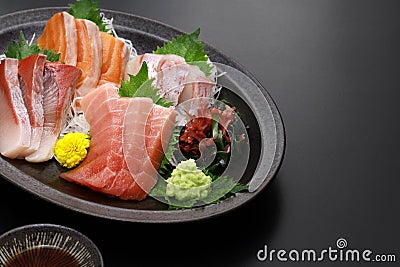 assorted sashimi tuna(medium fatty), salmon, yellowtail, and sea bream. authentic Japanese dining. Stock Photo