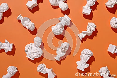 Assorted scattered white busts in antique Roman style Stock Photo