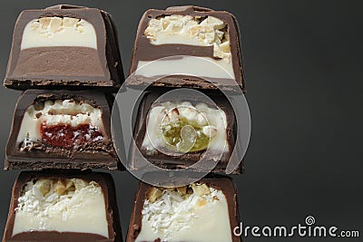 Assorted set of chocolate case candies with vanilla praline filling and jelly berry cherry lemon mango and chocolate close-up on a Stock Photo