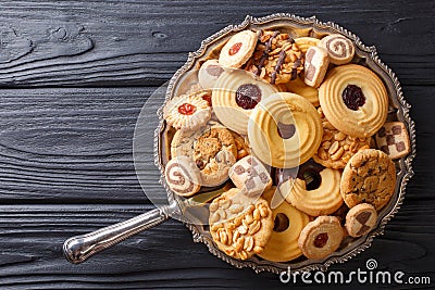 Assorted shortbread cookie close-up on a plate. vertical view fr Stock Photo