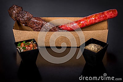 Assorted skewers on black background Stock Photo