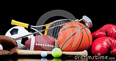 Assorted sports equipment on black Stock Photo