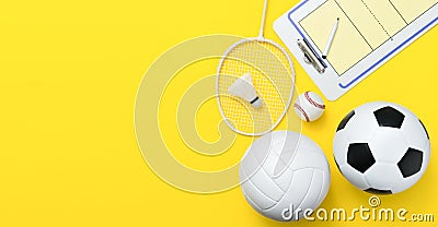 Assorted sports equipment on yellow background with copy space Stock Photo