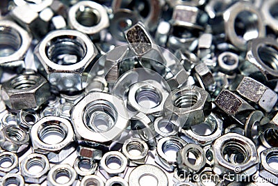 Assorted steel nuts Stock Photo