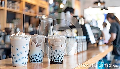 Assorted tapioca bubble teas on blurred coffee shop background with space for text Stock Photo