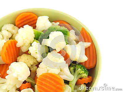 Vegetables in bowl isolated closeup Stock Photo