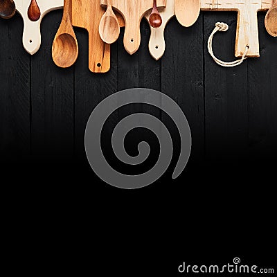 Assorted wooden spoons and chopping boards Stock Photo