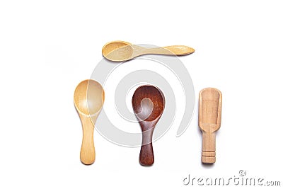 Assorted wooden spoons on a white background . Empty spoons. Set of wooden spoons. eco-friendly dishes. Protection of the Stock Photo