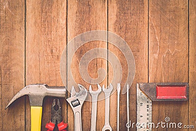 Assorted work tools on wood Stock Photo