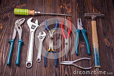 Assorted work tools on wood Stock Photo