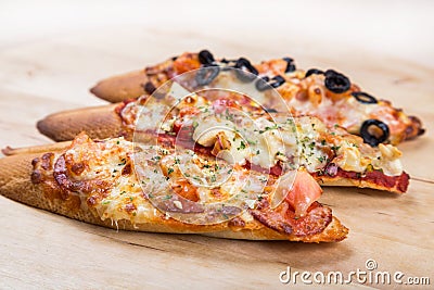 Assorti bruscjetta with sausage, cheese, tomato fron big white b Stock Photo