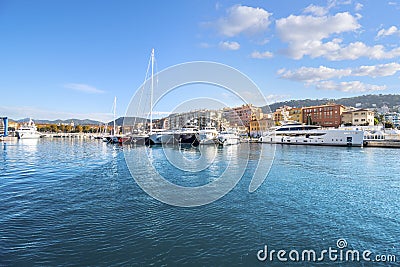 An assortment of boats and watercraft in the old harbor of Port Lympia in the city of Nice France Editorial Stock Photo