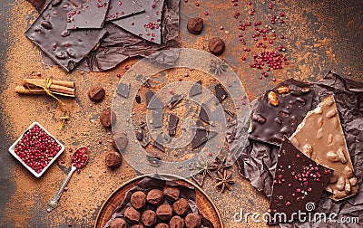 Assortment of chocolate bars, truffles, spices and cocoa powder Stock Photo