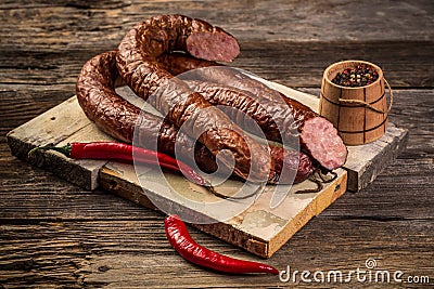 Assortment of cold meats, variety of processed cold meat products. On a wooden background Stock Photo