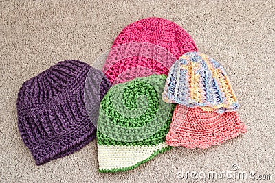 Assortment of Crocheted Hats Stock Photo
