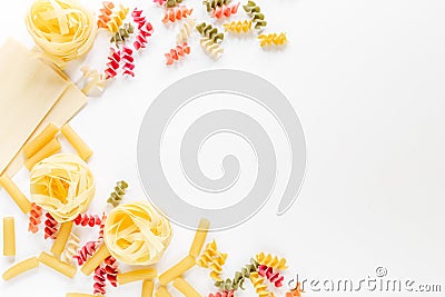 Assortment of different shape italian pastas on white background top view copyspace Stock Photo