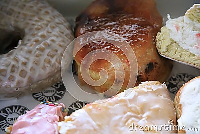 Assortment of donuts in a box for breakfast Stock Photo