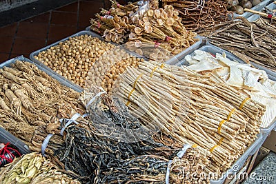 Assortment of dried plants used for traditional chinese herbal medicine Stock Photo