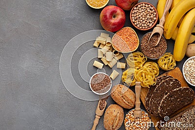 Assortment of food rich on fiber and carbohydrates on gray Stock Photo