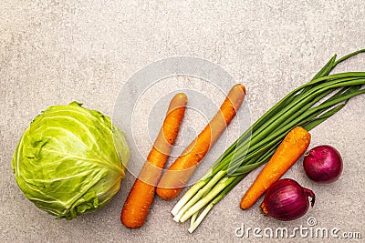 Assortment fresh organic vegetables. Food cooking stone background. Ingredients for cole slaw salad. Healthy vegetarian vegan Stock Photo