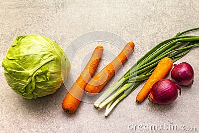 Assortment fresh organic vegetables. Food cooking stone background. Ingredients for cole slaw salad. Healthy vegetarian vegan Stock Photo