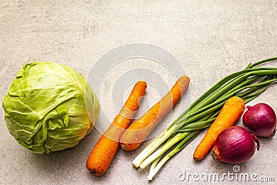 Assortment fresh organic vegetables. Food cooking stone background. Ingredients for cole slaw salad. Healthy vegetarian vegan Stock Photo