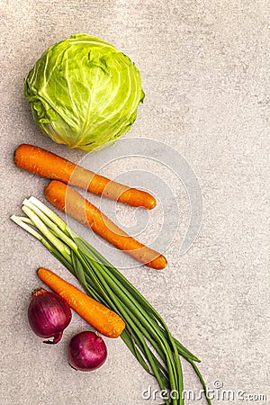 Assortment fresh organic vegetables. Food cooking stone background. Ingredients for cole slaw salad. Healthy vegetarian vegan Stock Photo