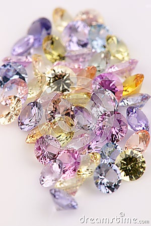 Assortment of multicolored Precious Stones. Stock Photo