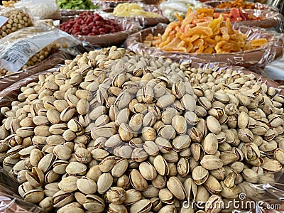 Assortment of nuts and dried fruits at market stand in Domodossola, Italy. Stock Photo