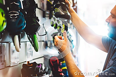 Assortment roller skates isolated in store shop, person choosing and buy color roller-skates on backgraund sun flare, healthy and Stock Photo