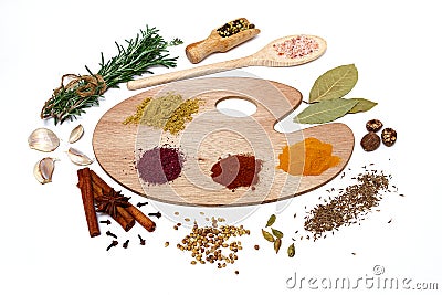 Assortment of spices on a polish for artist paints, on a white background, top view, horizontal, no peope Stock Photo