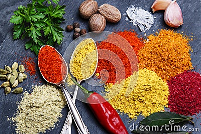 Assortment of spices seasoning on a black stone Stock Photo