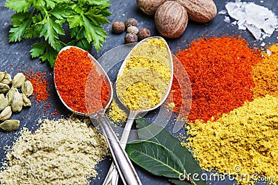 Assortment of spices seasoning on a black stone Stock Photo