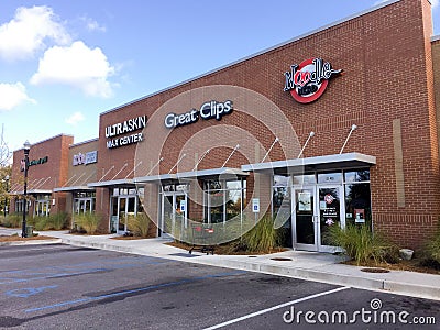 Assortment of stores in strip mall Editorial Stock Photo