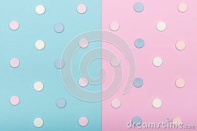 Assortment of various colourful pills isolated on blue pastel coloured background. Medication and prescription pills flat lay. Stock Photo