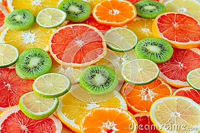 Assorty of sliced citrus fruits. Can be used as background Stock Photo