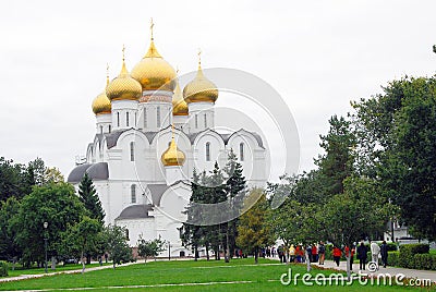 Assumption Church in Yaroslavl, Russia. People walk towards the church. Editorial Stock Photo