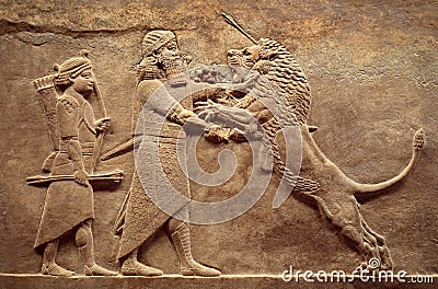 Assyrian wall relief, detail of panorama with royal lion hunt Stock Photo