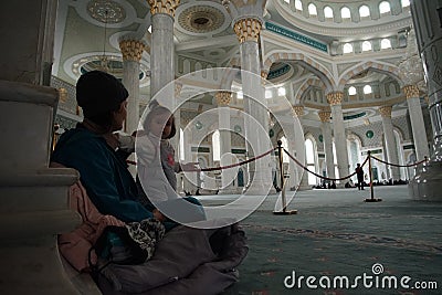 Astana city people on the carpet in Hazrat Sultan mosque Editorial Stock Photo