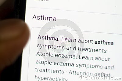 Asthma News.News on the phone.Mobile phone in hands. selective focus and chromatic aberration effects Stock Photo