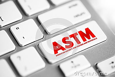 ASTM - American Society for Testing and Materials is an international standards organization, text concept button on keyboard Stock Photo