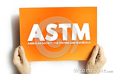 ASTM -American Society for Testing and Materials is an international standards organization, text concept on card Stock Photo